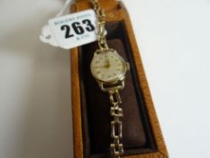 A 9ct Omega ladies wristwatch with 9ct bracelet, 11.23gms total