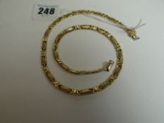 A 9ct yellow gold flat-link necklet, 13.1gms