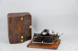A Blickensderfer no. 7 portable typewriter in original wooden carry case