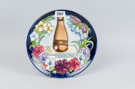 A Moorcroft 'Centennial' limited edition (349/750) plate 1897-1997, designed by Rachel Bishop, boxed