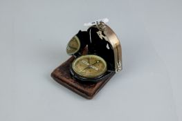 A leather encased German Bezard-Kompass bearing the nos. 11585 and the word 'Richting'