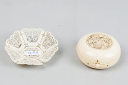 A miniature pierced and patterned circular sectional basket of fretted ox bone and an Oriental ivory