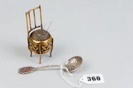 A Spanish white metal spoon with coin bowl and coat of arms to the handle 'Las Palmas' and an