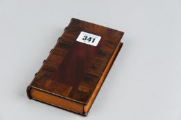 An early 19th Century rosewood and crossbanded wooden box in the form of a book, the base of the