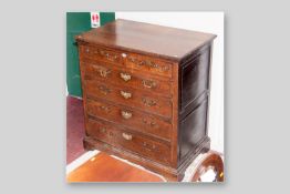 A late 18th/early 19th Century chest of two short and four long drawers with cock beaded edges,