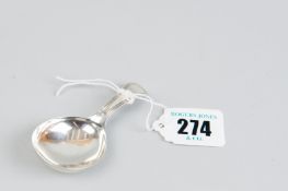 A caddy spoon - a silver caddy spoon with circular plain bowl and shaped and curved handle, 0.2 ozs,