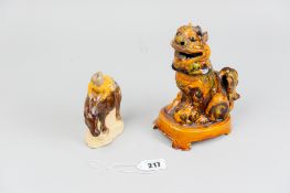 Two late 18th/early 19th Century treacle glazed figures, one of a yellow jacketed gentleman riding