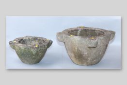 Two cauldron shaped stoneware planters, 10.25 x 16.5 ins (26 x 42 cms) the largest, (crack to one)