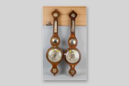 Two Victorian walnut cased banjo barometers, one with painted silver decoration, both