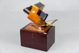 A Victorian mahogany and brass photochromoscope, patented by F E Ives, serial no. 322, for 3D
