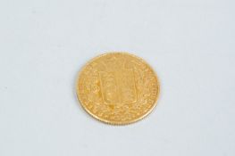 An 1843 gold sovereign, 7.6 grms in fine condition