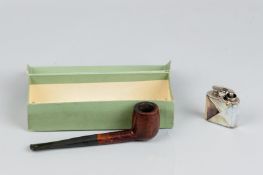 A gentleman's smoking pipe in a Loewe cardboard box and a mother of pearl encased cigarette lighter