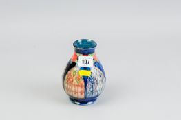 A Moorcroft 'Trial' vase of ovoid form with split blue colourway, a single floral band surrounding
