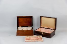 A Victorian rosewood workbox with mother of pearl cartouche and escutcheon having a re-lined