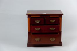 A late Victorian/early Edwardian oak and mahogany apprentice chest, half cut columns and top