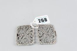 A belt buckle - a two piece silver belt buckle of pierced floral and bird form, 1.4 ozs, London