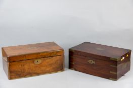 A Victorian mahogany and brass bound writing slope with brass inset carrying handles and a Victorian