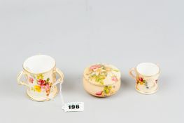A Royal Worcester blush ground and floral decorated lidded pot, 2.75 ins (7 cms) diameter, a three