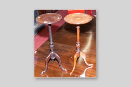 A Victorian rosewood wine table with turned column and hoof shaped supports and an Edwardian