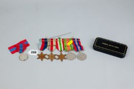 A bar of five World War medals with ribbons, un-named and a cased Imperial Service medal and ribbon
