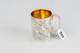 A silver mug - bright cut with leaf and bird decoration, 3.6 ozs, Sheffield 1951