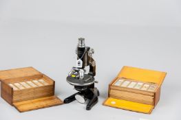 A W & H Seibert Wetzlar japanned microscope, no. 34639 along with three boxes of pathology slides