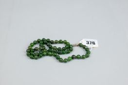 A dark green jade beadwork necklace