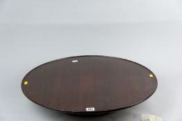 A large tray top mahogany 'Lazy Susan', 4.5 x 24.25 ins (11.5 x 62 cms)