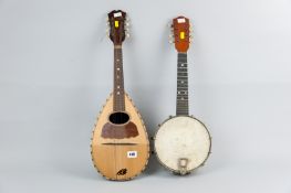 A 20th Century mandolin with maker's label inside to include the words 'Cesare Wolf, Venezia', 24