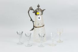 Five Victorian glass penny licks, various heights and a cut glass claret jug with metal mounts and