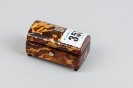 An oblong silver mounted tortoiseshell patch box with slightly domed lid with later additional