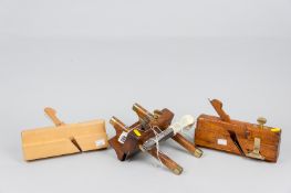A hand-crafted moulding plane, a vintage fully adjustable fillister plane and a vintage wood and