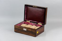 A Victorian Coromandel lidded jewellery box with mother of pearl cartouche and escutcheon, the lid