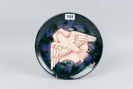 A Moorcroft pottery limited edition (178/500) year plate for 1993, decorated in the 'Dove'