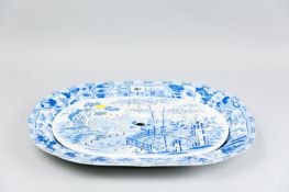 An A J & W Ridgway pottery blue and white meat plate with castle scene transfer decoration from