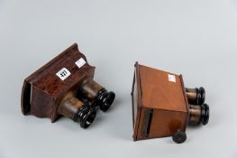 A Victorian burr walnut stereoscope viewer along with a Victorian mahogany stereoscope viewer