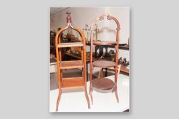 An Edwardian mahogany and line inlaid three tier cakestand with turned finial and shaped supports