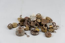 A collection of brass and iron and brass padlocks, some with keys and maker's marks, in various