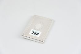 A card case - an engine turned silver card case with fitted compartmented interior, uninscribed