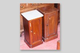A Victorian mahogany and marble topped pot cupboard and a similar mahogany example, 29 ins (74