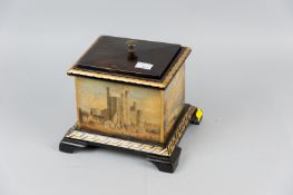 An unusual 19th Century slate lidded box (lid replaced) painted with panels of Welsh scenes