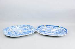 A 19th Century blue and white pottery meat platter, transfer decorated with a central boating