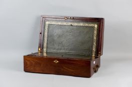 A Victorian mahogany writing slope with brass plaque escutcheon and carrying handles, the lift-up