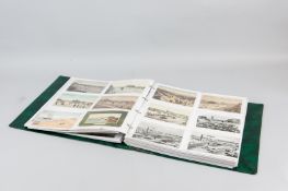 A large album of vintage postcards 'History of Rhyl', approximately three hundred and eighty showing