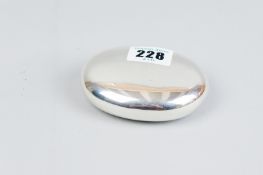 A silver box - an oval plain silver box with finely hinged plush lid, the lid bearing the name '