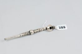 A decorative white metal, possibly Continental silver opium pipe