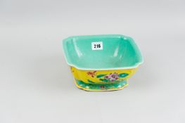 A circa 19th Century Chinese yellow ground and floral decorated bowl having turquoise interior and