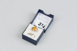 A nine carat white gold wide wedding band, 2.6 grms and a nine carat white gold signet ring with two