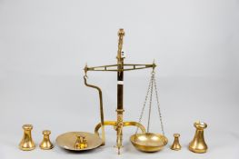 A good set of 19th Century brass W & T Avery Ltd scales, the brass beam and pans suspended from a