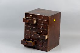 A 19th Century wooden collector's cabinet of sixteen drawer with mainly turned bone knobs (some